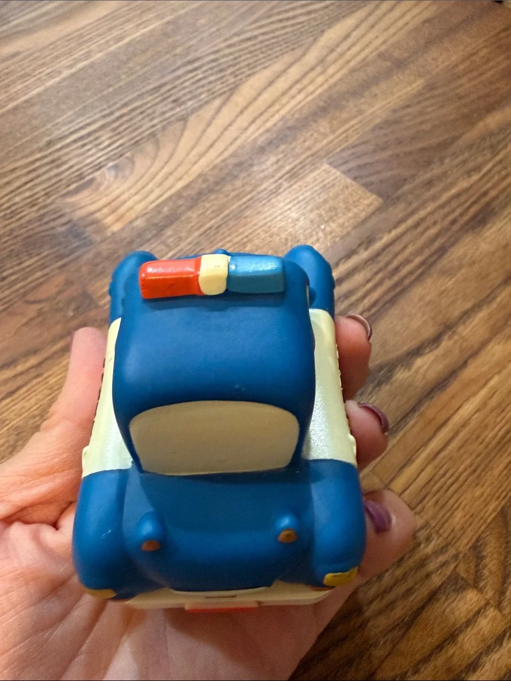 Smiling Blue Police Car Toy for Kids - Soft Squeezable Play Vehicle